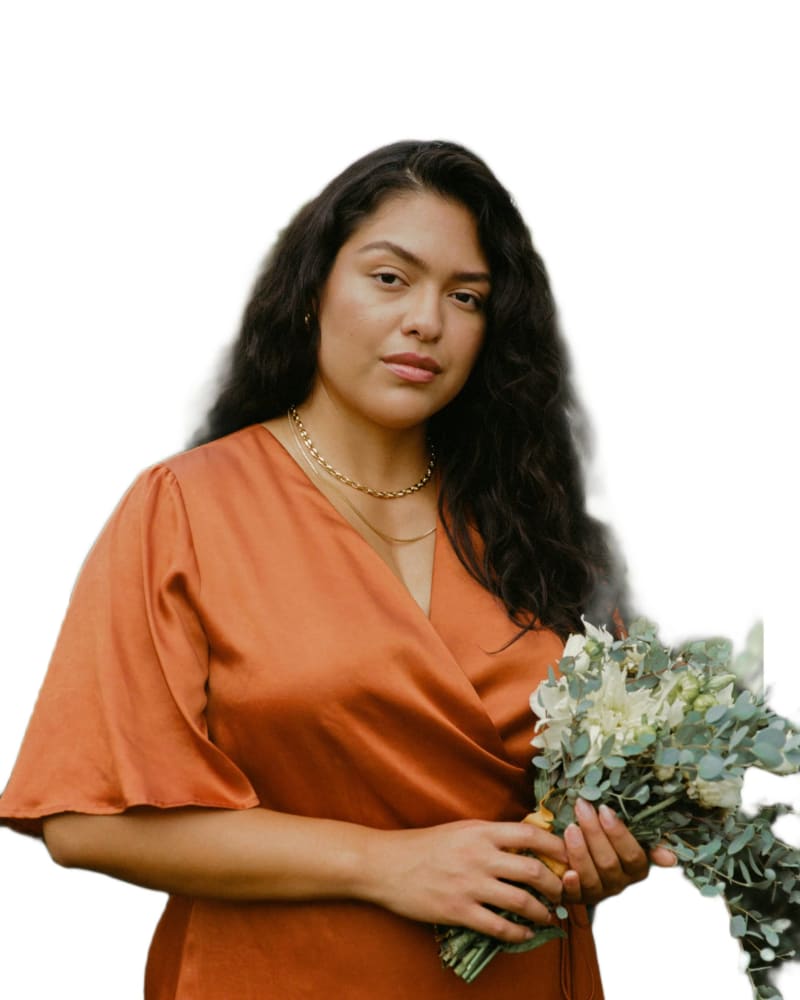 Side of a model wearing a size 3X Lola Wrap Dress in Rust by Whimsy and Row. | dia_product_style_image_id:309972